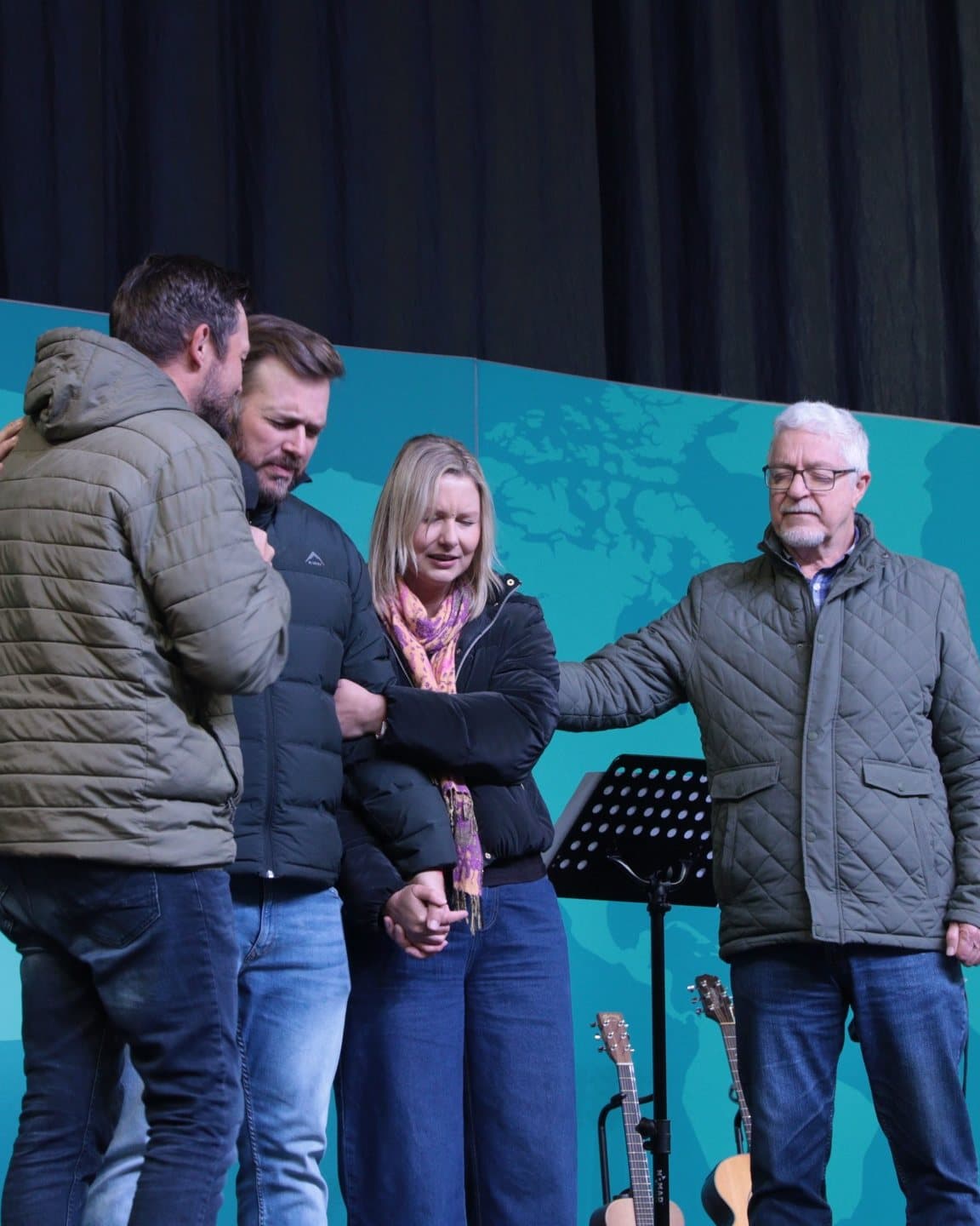 People praying together at His Kingdom Church